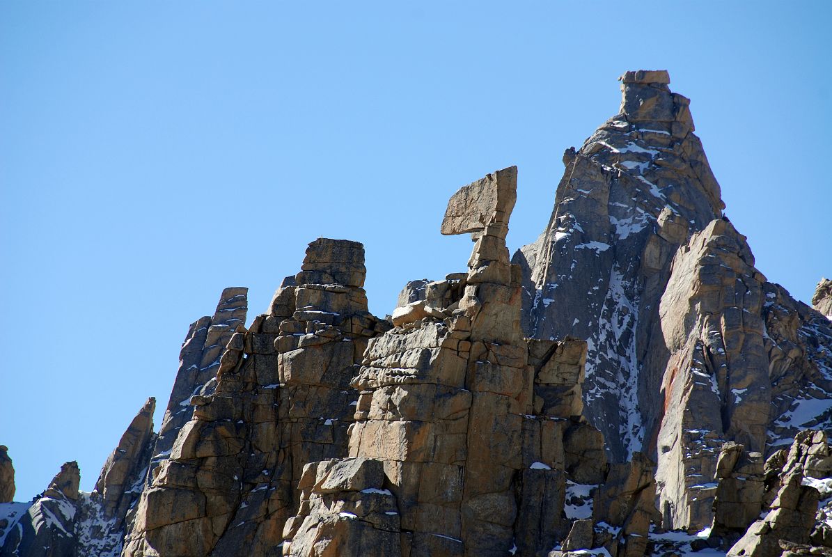 57 Axe Of Karma Rock Formation On Descent From Dolma La On Mount Kailash Outer Kora As a last remembrance of past trials he sees a strange upright rock, in the shape of an axe, on his way down to the valley. It is the emblem of the King of Death, and it is called the axe of Karma. To the pious pilgrim it has lost its power through the mercy of Tara, the Saviouress, because mercy is stronger than Karma; it washes away our past deeds in the tears of compassion for all suffering beings. Sharing the suffering of all leaves no place for one's own suffering, and finally results in one's growing beyond one's own little ego. - The Way of the White Clouds by Lama Anagarika Govinda.